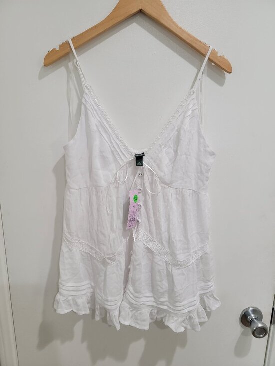 wild fable Tops - Flyaway babydoll tank top from Wild Fable™ is a perfect pick for breezy days.